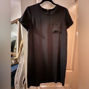 Black short sleeve dress with gold zipper in back